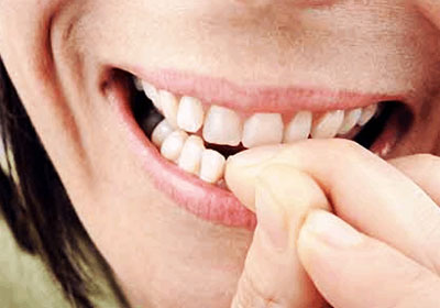 saúde digestiva e roer unhas