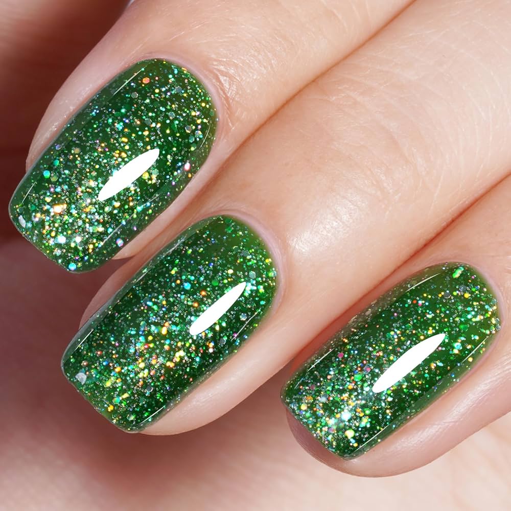 unha gel verde efeito olho de gato com glitter