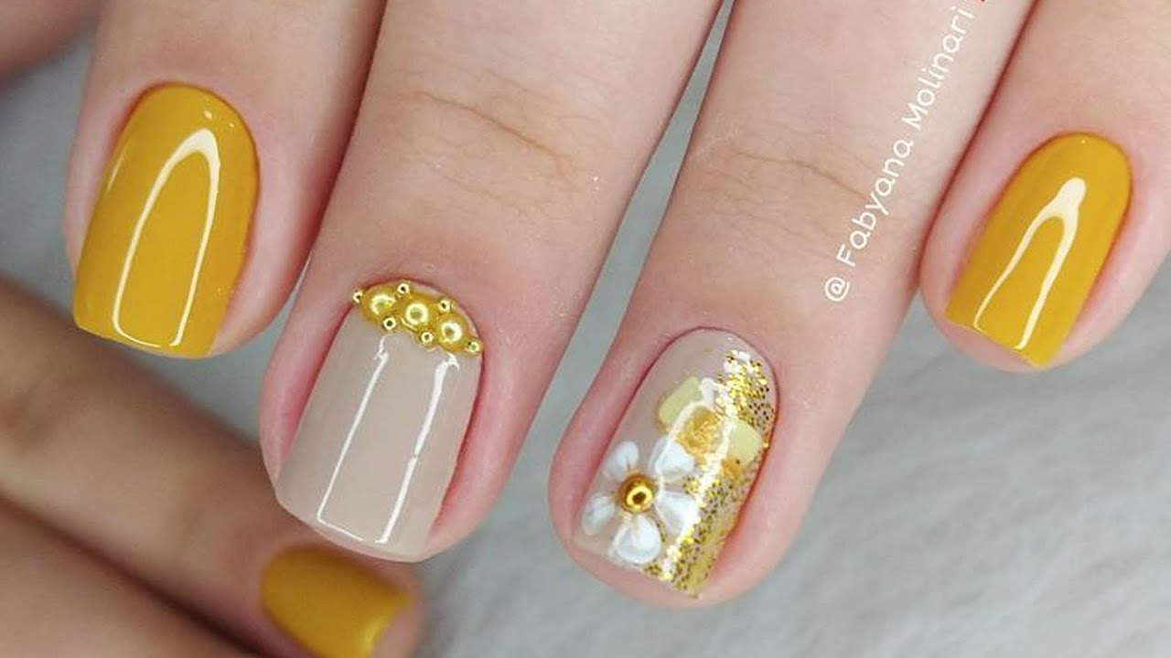 unha amarela esmalte