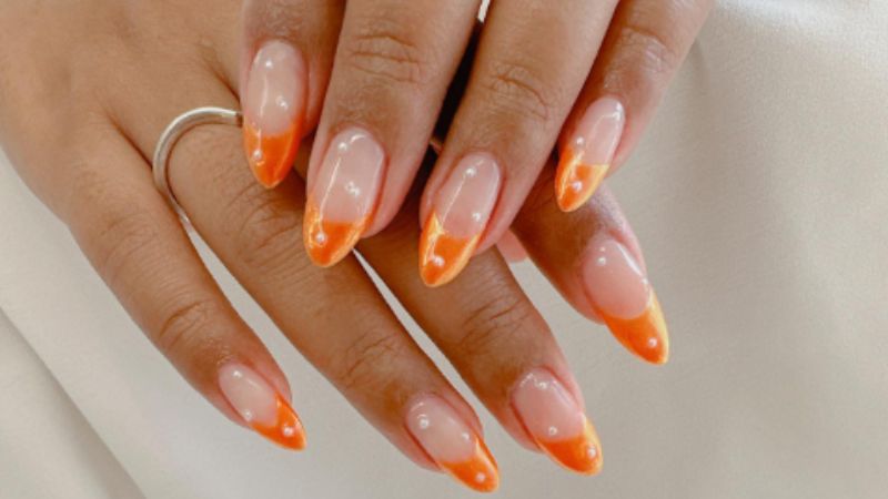 unha decorada laranja abstrata