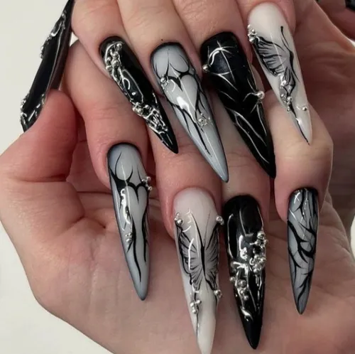 Guia Completo de Unhas Stiletto; Como Escolher o Formato de Unha Ideal; Decorações Incríveis para Unhas Pontudas; Alongamento de Unhas: Stiletto em Gel ou Fibra?; Mitos e Verdades sobre Unhas Stiletto.