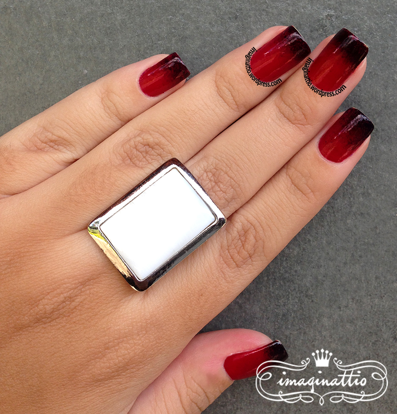 Unhas stiletto vermelho e preto