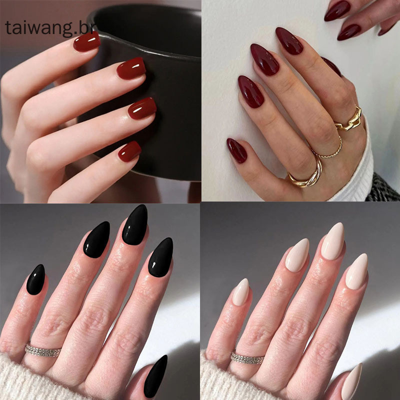 unhas vermelhas com detalhes pretos
