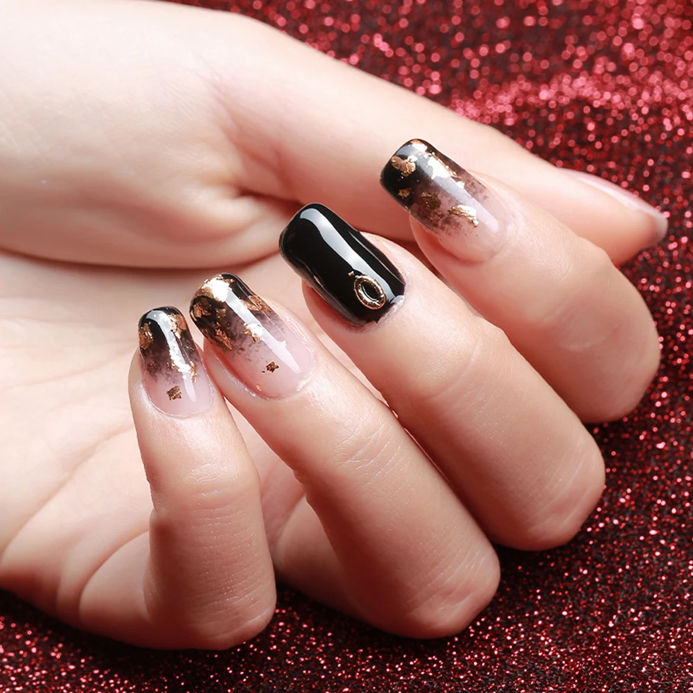 unha amendoada preta com glitter em gel