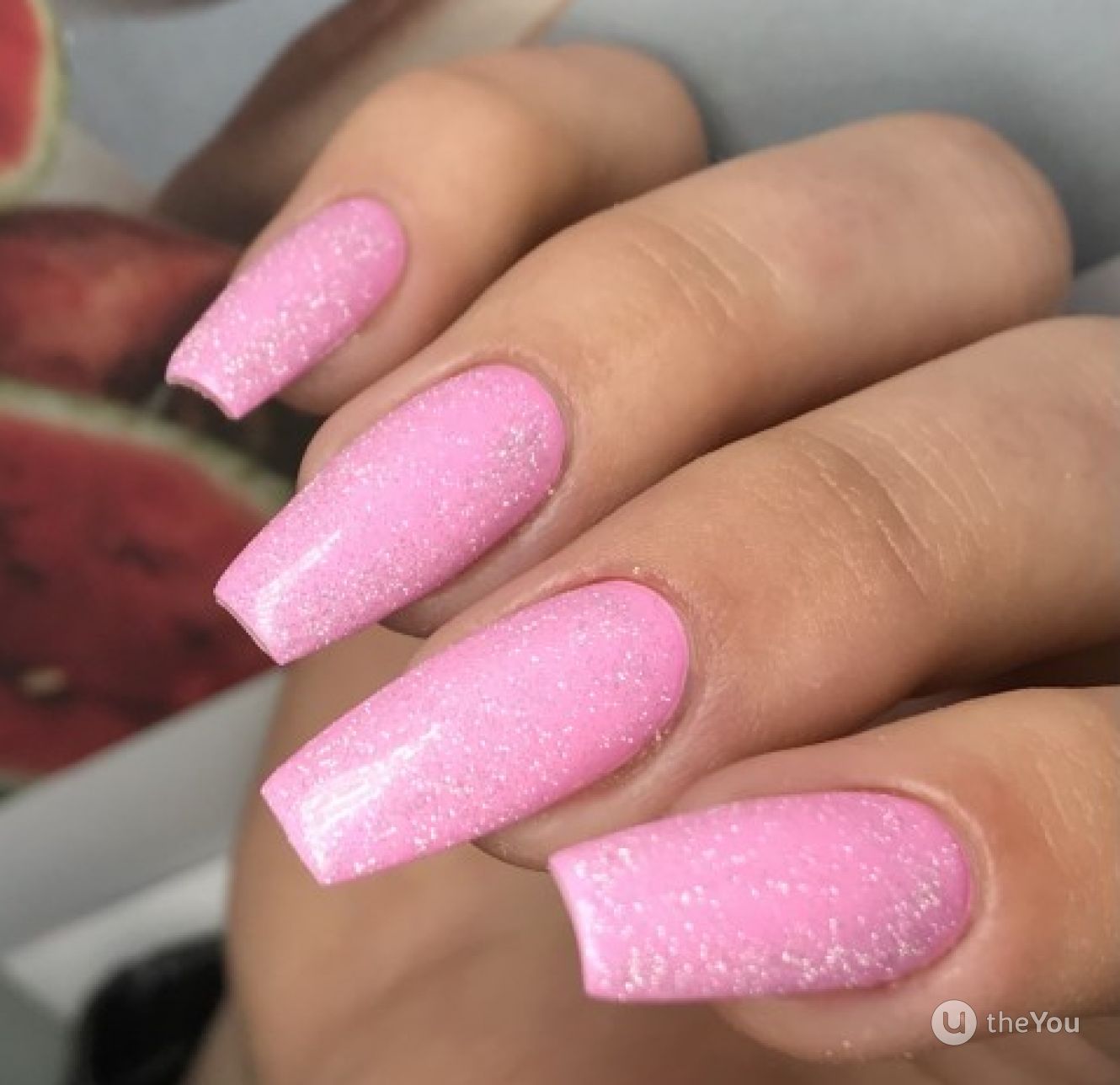 unha bailarina rosa decorada com flor