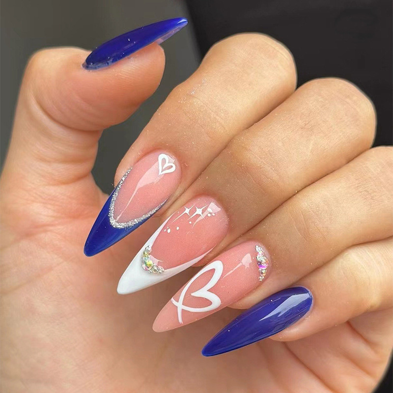 unha stiletto azul royal decorada